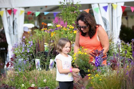 mother-and-daughter-buying-plants_940x627